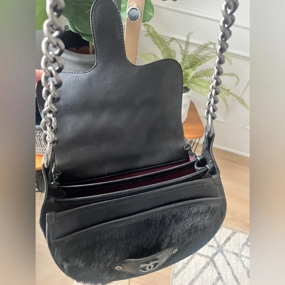 CHANEL Black Quilted & Fur Star-Studded Saddle Bag